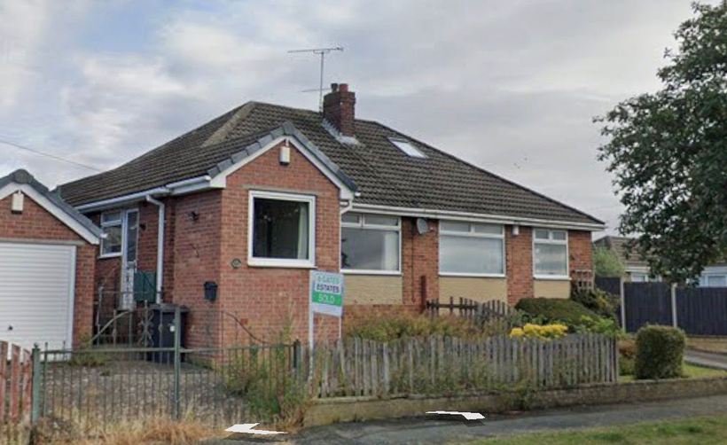 Bungalow before the work, with the original roof