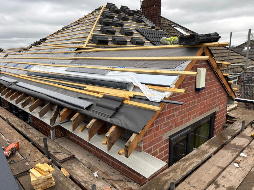 Bungalow roof stripped to the rafters mid re-roof