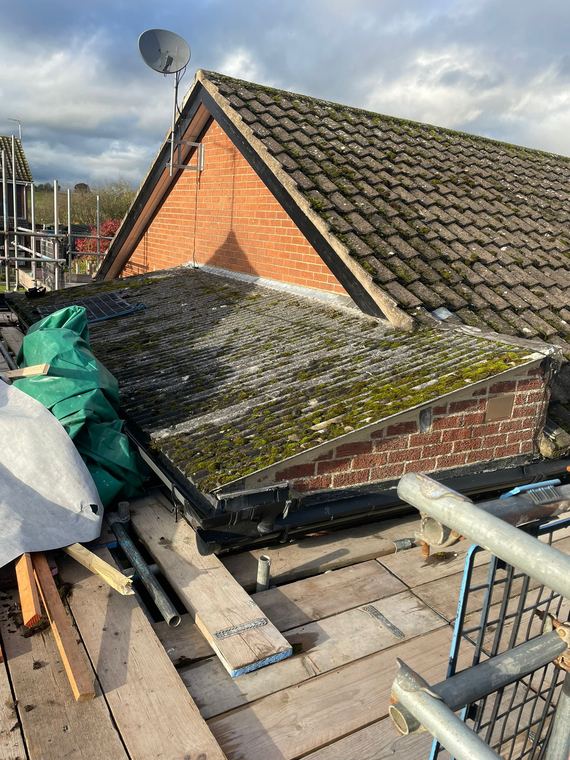 Old roof stripped back to the timbers